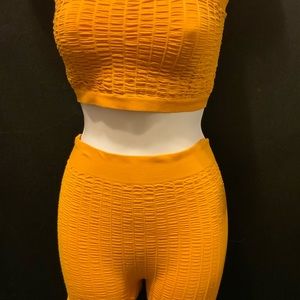 Yellow stretchy 2 pc outfit size small/medium